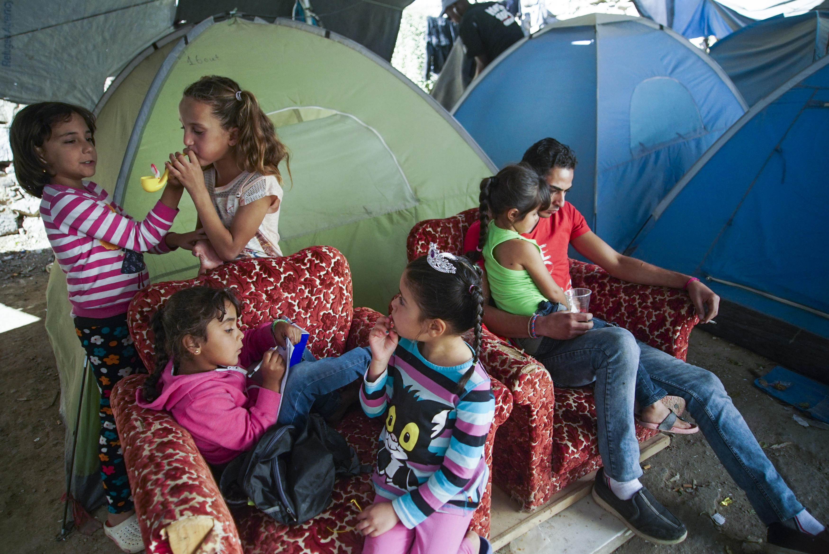 Underaged inhabitants of tent seashore camp near Vial refugee camp. Chios, Grece, Aegean Sea. 27 September, 2016.jpg